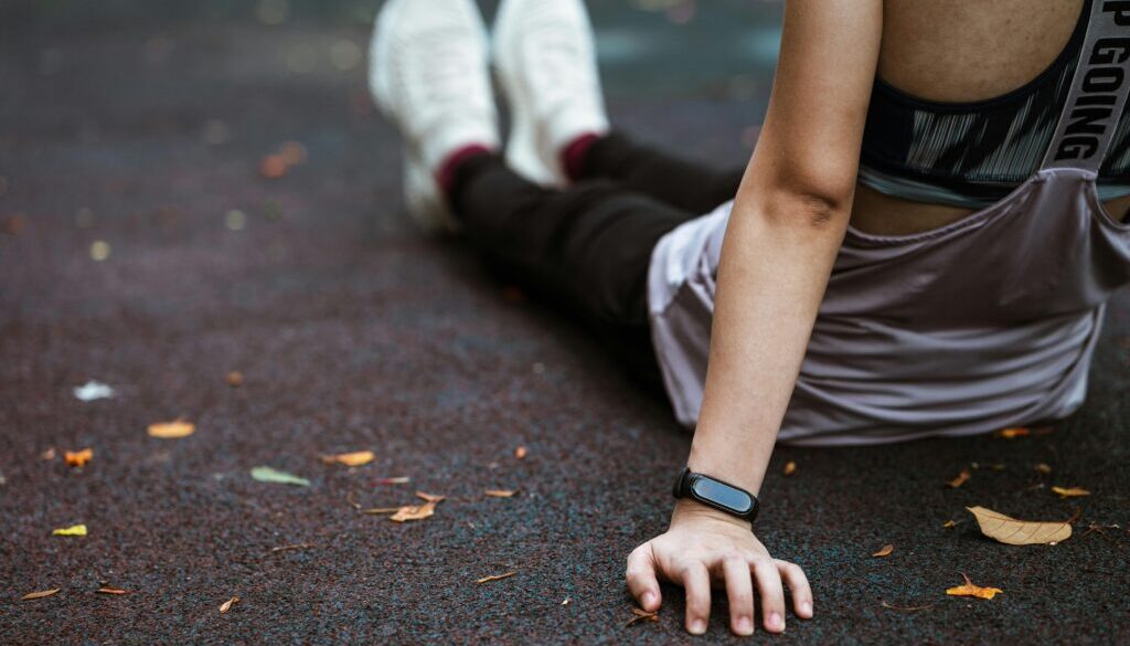 A person jogging outdoors, illustrating the benefits of cardio exercises for improved cardiovascular health and weight loss.